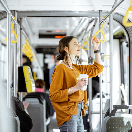 Female passenger using public transport