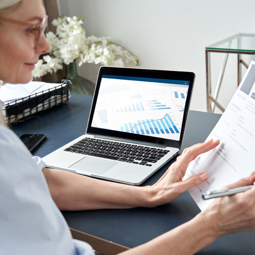 Female hr reading cv during online virtual job interview by video call.